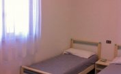 appartament DUCA DEGLI ABRUZZI: C7 - chambre avec deux lits (exemple)