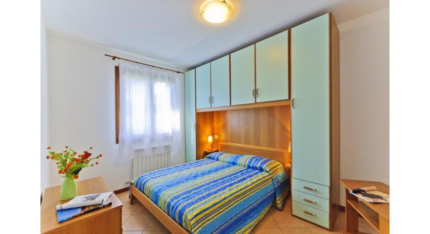 résidence VILLAGGIO DEI FIORI: B4 - chambre à coucher double (exemple)