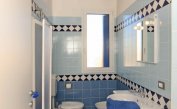 apartments STEFANIA: B4 - bathroom with washing machine (example)